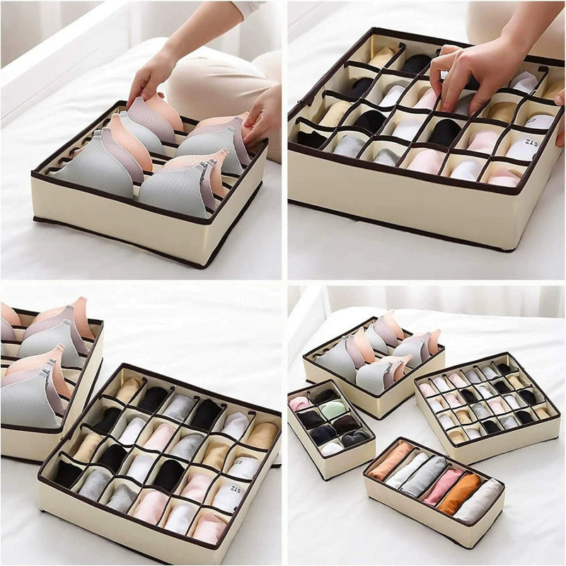 Off-white fabric drawer organizers holding bras, underwear, and socks