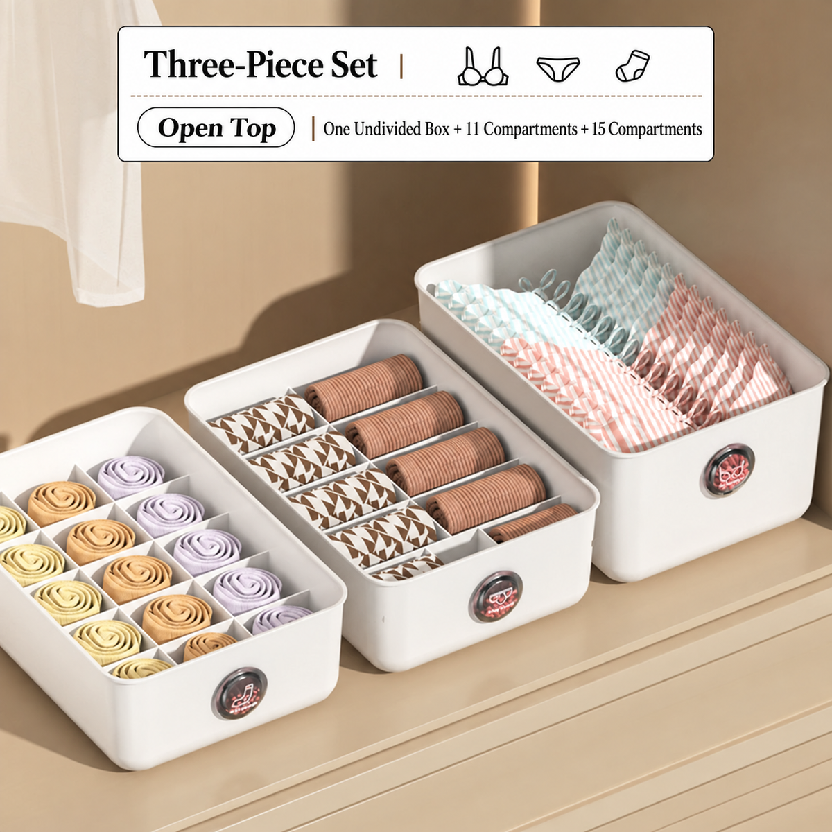Three white open-top storage boxes with bra, underwear, and sock layouts